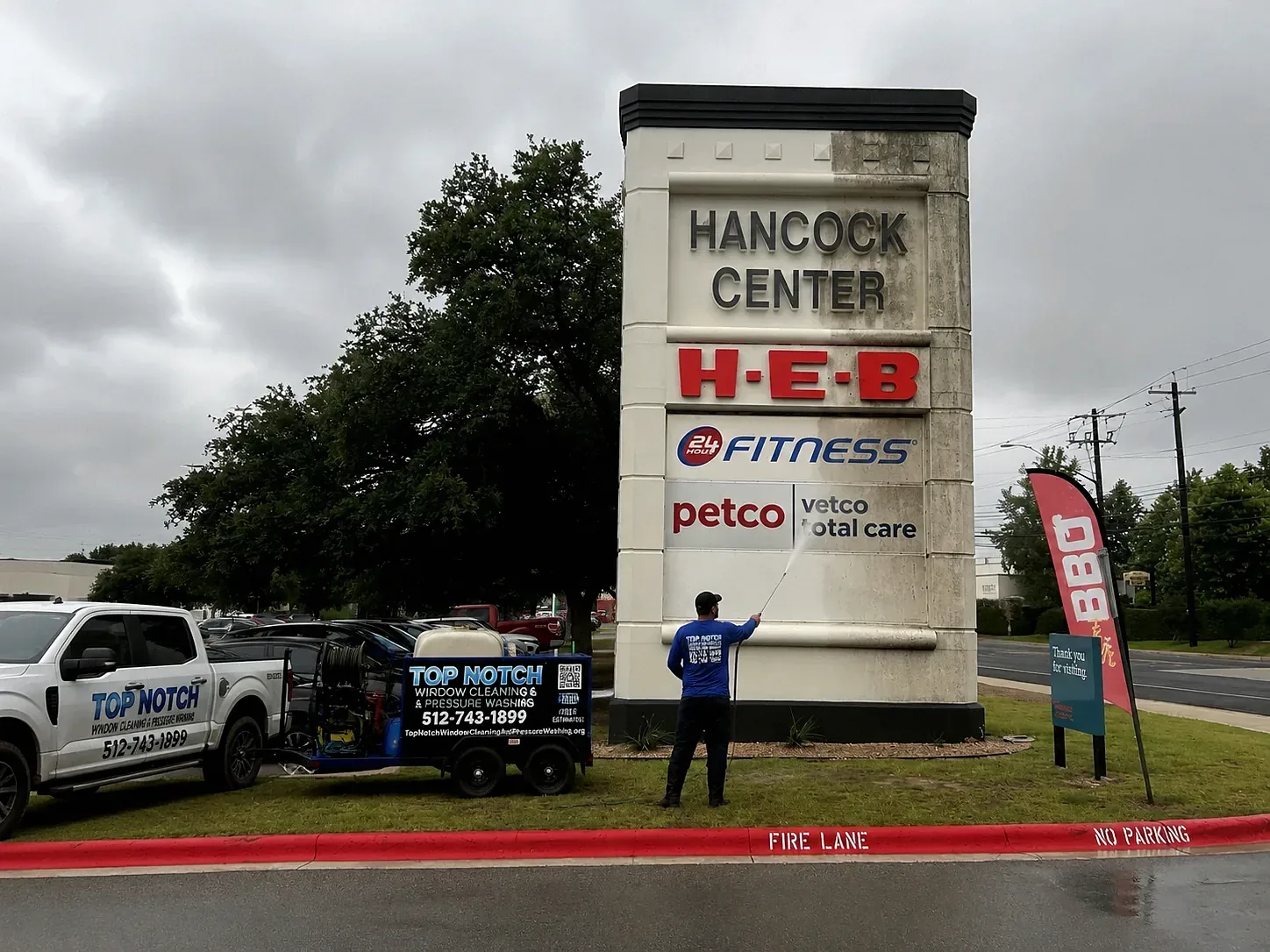 Top Notch pressure washing at Hancock Center in Houston